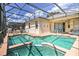 Beautiful screened-in pool and patio area, perfect for enjoying outdoor living and entertaining in a private setting at 214 Tupelo Cir, Davenport, FL 33897