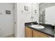 Bathroom with a vanity, a mirror, and a shower and toilet combo at 223 Cadiz Loop, Davenport, FL 33837