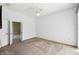 Spacious bedroom with a ceiling fan and access to the bathroom and a closet for comfort and convenience at 223 Cadiz Loop, Davenport, FL 33837