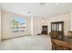Cozy dining room with large window and traditional furnishings, creating a welcoming space for meals and gatherings at 223 Cadiz Loop, Davenport, FL 33837