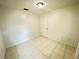 Bedroom with tile flooring, neutral paint and fixtures at 2330 Prime Cir # A, Kissimmee, FL 34746