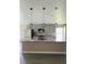 Beautiful kitchen island featuring granite countertops, stainless steel appliances, and pendant lighting at 2385 Andrews Valley Dr, Kissimmee, FL 34758
