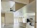 Open-concept kitchen featuring an island, stainless steel appliances, and neutral-colored cabinetry at 2385 Andrews Valley Dr, Kissimmee, FL 34758