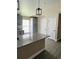 Kitchen island with granite countertops, pendant lighting and stainless steel appliances at 2385 Andrews Valley Dr, Kissimmee, FL 34758