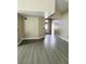 Open living room featuring neutral paint, gray flooring, and natural light at 2385 Andrews Valley Dr, Kissimmee, FL 34758