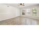 This bedroom features windows for natural light at 2411 Parsons Pond Cir, Kissimmee, FL 34743