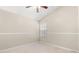 Bedroom featuring natural light and tile flooring at 2411 Parsons Pond Cir, Kissimmee, FL 34743