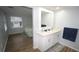 Bathroom boasts a double sink vanity with views of the bedroom at 2618 Brookside Cir, Mount Dora, FL 32757