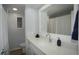 Bathroom featuring a sleek vanity, decorative accessories and a shower with curtain at 2618 Brookside Cir, Mount Dora, FL 32757