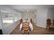 Dining area featuring wood-look floors, neutral walls, and a built-in buffet for ample storage at 2618 Brookside Cir, Mount Dora, FL 32757
