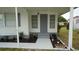 Image displays front entrance, clean lines, and professionally landscaped front yard at 2618 Brookside Cir, Mount Dora, FL 32757