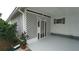 Photo showcases the detailed lattice work, freshly painted concrete, and well maintained exterior at 2618 Brookside Cir, Mount Dora, FL 32757