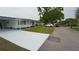 Well-maintained mobile home with a long driveway and space for parking at 2618 Brookside Cir, Mount Dora, FL 32757
