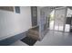 Inviting entrance from sunroom features neutral colors and views to exterior at 2618 Brookside Cir, Mount Dora, FL 32757