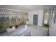 Cozy sunroom with lattice screening, ample natural light and neutral color scheme at 2618 Brookside Cir, Mount Dora, FL 32757