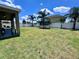 Expansive backyard with a trampoline and plenty of space for outdoor activities at 2691 Cypress Tree Trl, St Cloud, FL 34772