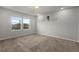 Bright carpeted bedroom boasts ceiling fan and plenty of natural light at 2702 Giardino Loop, Kissimmee, FL 34741