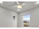 Bedroom featuring fan, recessed lighting, and large window at 2702 Giardino Loop, Kissimmee, FL 34741