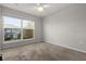Spacious bedroom with natural light and soft carpet at 2702 Giardino Loop, Kissimmee, FL 34741