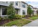 Attractive two-story home with lush landscaping in the front at 2702 Giardino Loop, Kissimmee, FL 34741