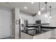 Modern kitchen featuring stainless steel appliances, sleek countertops, and ample cabinet space at 2702 Giardino Loop, Kissimmee, FL 34741