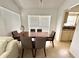 Dining area with a modern table and chairs, perfect for Gathering meals and entertaining at 2711 Emerson Ln, Kissimmee, FL 34743