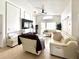 Bright and airy living room with vaulted ceiling and comfortable seating arrangement at 2711 Emerson Ln, Kissimmee, FL 34743