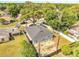Charming single-Gathering home with a well-maintained yard, privacy fence, and mature trees in a desirable neighborhood at 308 E Orange St, Kissimmee, FL 34744