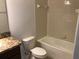 This bathroom features a white tub and shower combo next to the toilet at 3319 Rodrick Cir, Orlando, FL 32824