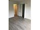 Bedroom with closet and new hardwood flooring at 3319 Rodrick Cir, Orlando, FL 32824