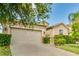 Charming one-story home with a two-car garage and well-maintained landscaping at 3589 Cortland Dr, Davenport, FL 33837