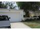 Charming one-story home featuring a garage and beautifully maintained landscaping at 386 San Jose Dr, Winter Haven, FL 33884