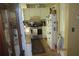 Efficient kitchen design with white cabinetry and stainless steel appliances at 386 San Jose Dr, Winter Haven, FL 33884