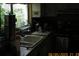 Modest kitchen featuring a double basin sink with garden view at 386 San Jose Dr, Winter Haven, FL 33884