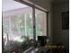 Window view of lush greenery and garden, bringing natural light and a peaceful ambiance indoors at 386 San Jose Dr, Winter Haven, FL 33884