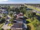 A neighborhood with homes featuring screened pools and lush landscaping, reflecting a serene and desirable living environment at 421 Bailey Cir, Davenport, FL 33897