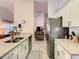 Well-appointed kitchen featuring modern appliances, sleek countertops, and ample cabinet space at 421 Bailey Cir, Davenport, FL 33897