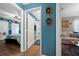 Hallway view of a bedroom and bathroom with a glass shower at 4301 Mohawk Ct, St Cloud, FL 34772