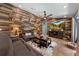Spacious living room with wood-look accent wall and open layout at 4301 Mohawk Ct, St Cloud, FL 34772