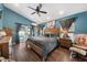 Spacious main bedroom with pool access, vaulted ceiling and en-suite bathroom at 4301 Mohawk Ct, St Cloud, FL 34772