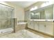 Bathroom featuring a separate shower, soaking tub, double vanity and ceramic tile flooring at 4310 Seven Canyons Dr, Kissimmee, FL 34746