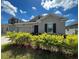Charming single-story home featuring a well-maintained front yard and attached two-car garage at 4310 Seven Canyons Dr, Kissimmee, FL 34746