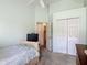 Bedroom featuring a ceiling fan and spacious closet at 4413 Chalfont Dr, Orlando, FL 32837