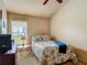Comfortable bedroom with natural lighting and a calming color palette at 4413 Chalfont Dr, Orlando, FL 32837
