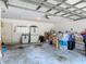 Spacious garage with storage cabinets, offering ample parking and organizational space at 4413 Chalfont Dr, Orlando, FL 32837