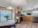 Bright eat-in kitchen featuring modern appliances and abundant natural light at 4413 Chalfont Dr, Orlando, FL 32837
