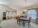 Spacious living and dining areas with great natural light, open floor plan, and comfortable furnishings at 4413 Chalfont Dr, Orlando, FL 32837