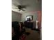 Bedroom with warm-toned carpet, a ceiling fan and ample natural light at 4714 Greycliff Prairie Dr, Kissimmee, FL 34758