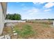 Large backyard with a privacy fence, patio, and green space perfect for outdoor activities and entertaining at 491 Majestic Gardens Blvd, Winter Haven, FL 33880