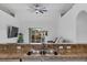 The Kitchen is spacious with lots of natural light and features stainless steel sinks and appliances at 491 Majestic Gardens Blvd, Winter Haven, FL 33880